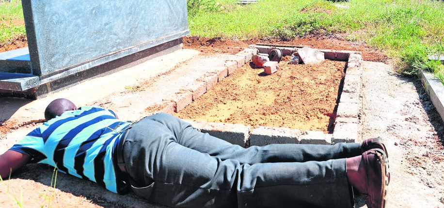 John Maduwe says three men took the family’s cellphones, money and his wife’s wedding ring at Mabopane graveyard.         Photo by Samson Ratswana