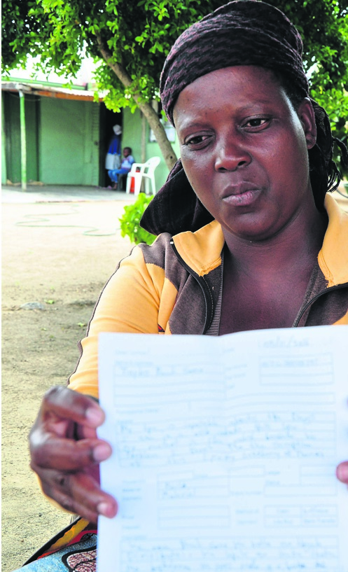 Mmapula Sono shows the letter they found after her brother Paul died.     Photos by   Samson Ratswana