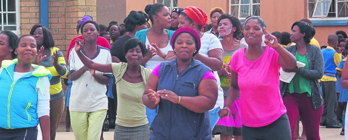 Parents protest at Mjuleni Primary School in support of the 11 teachers who claim the school has been plagued by mismanagement of funds, abuse of power and muthi.        Photos by Thamsanqa Mbovane