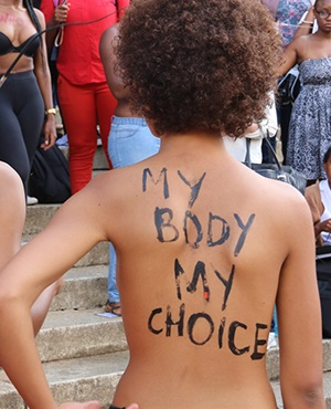 Students at the University of the Witwatersrand painted their bodies with phrases in protest against rape culture and sexual assault. Picture: Ndileka Lujabe