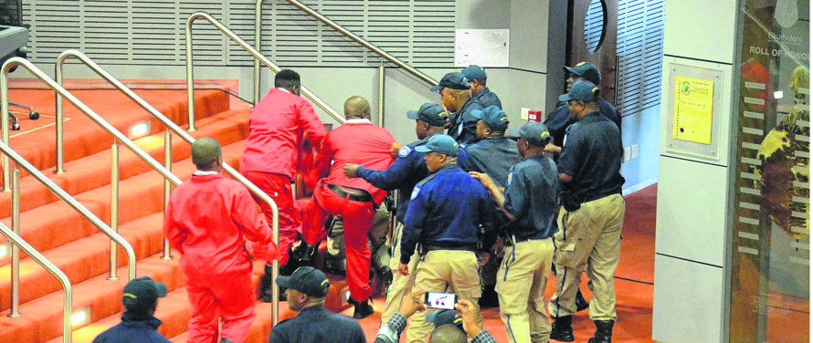 A fight broke out when Ekurhuleni Metro Police tried to remove EFF members from the house.    Photo by Happy Mnguni