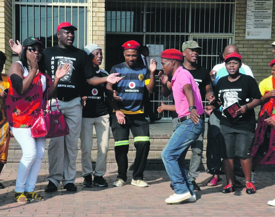 EFF supporters picket outside court yesterday, demanding that Napoleon Webster be granted bail.                             Photo by Dulile Sowaga