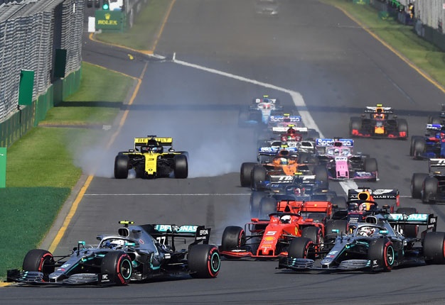 Mercedes Finnish driver Valtteri Bottas (L) leads a pack at the start of the Australian Grand Prix in Melbourne on March 17, 2019. Image: Peter PARKS / AFP