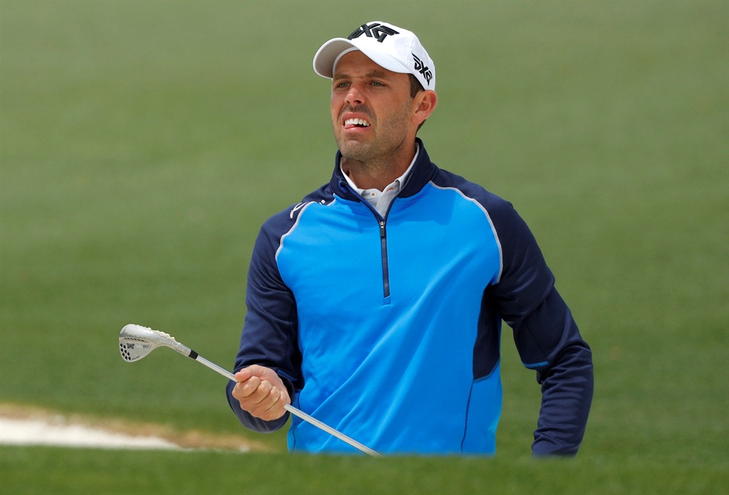 Charl Schwartzel looks over his chip from a bunker to the second green at Augusta National Golf Club in Augusta, Georgia, U.S. Picture: REUTERS/Jonathan Ernst