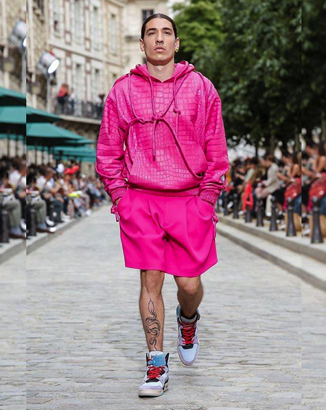 Hector Bellerin walks the Louis Vuitton catwalk at Paris Fashion
