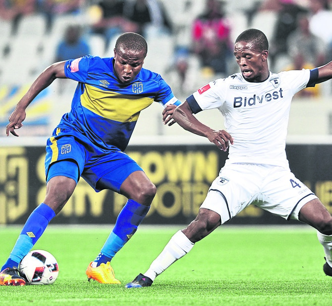 Lebogang Manyama of Cape Town City (left) battles it out with Phumlani Ntshangase of Bidvest Wits last night. Photo by BackpagePix