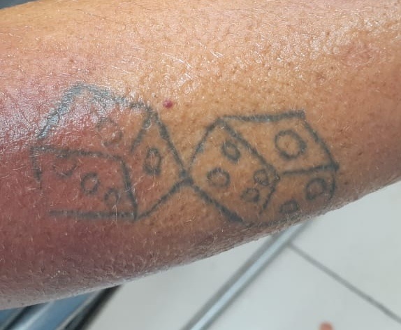 This tattoo was found on the deceased's right lower arm.