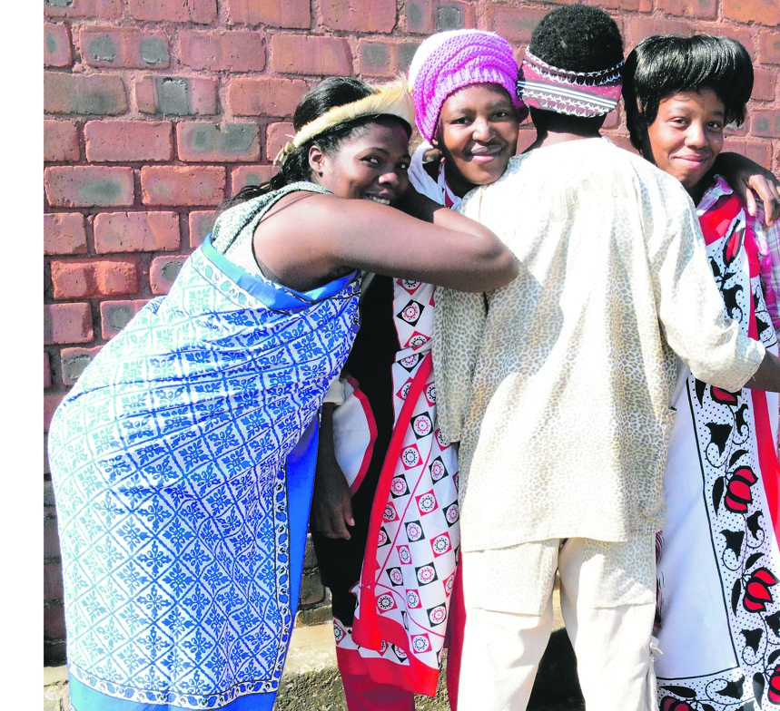 From left: Makhosi Ntuli, Nnana Mokoena and Nene Ngwenya say they are happy with one man, Doctor Mokoena.   Photo by Muntu Nkosi