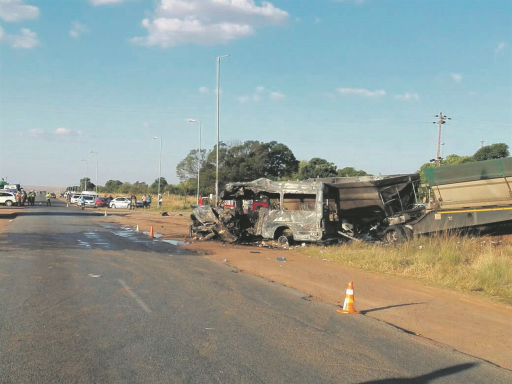 The aftermath of the blazing wreck of a taxi, which collided with a truck while transporting pupils home Picture: Simvuyele Mageza