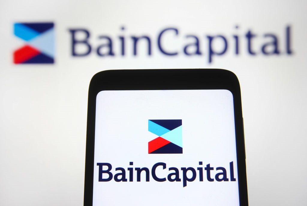 Bain Capital was founded in 1984 by executives from consulting firm Bain and Company, including Mitt Romney, who would eventually be the Republican party's losing presidential candidate in 2012. (Photo Illustration by Pavlo Gonchar/SOPA Images/LightRocket via Getty Images)