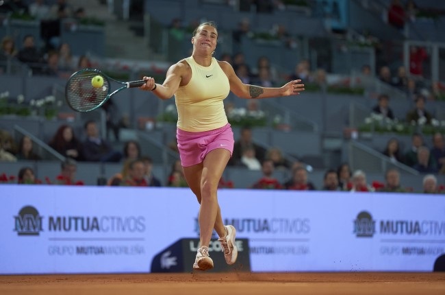 Aryna Sabalenka plays a forehand against Elena Rybakina during the Madrid Open semi-final on Thursday. (Mateo Villalba/Getty Images)