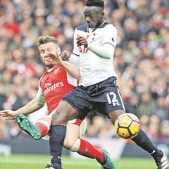 FLYING TACKLE:   Shkodran Mustafi of Arsenal challenges Victor Wanyama of Tottenham in a Premier League match. (Stuart MacFarlane, Arsenal FC via Getty Images)

