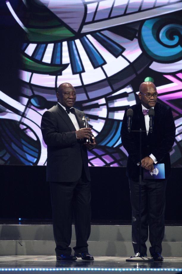President Cyril Ramaphosa (left) and Arts and Culture Minister Nathi Mthethwa wait for Mbongeni Ngema to fetch his award. Photo: Lucky Nxumalo