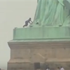 Woman scales Statue of Liberty and 6 more pictures of injustice and protest that gripped us 