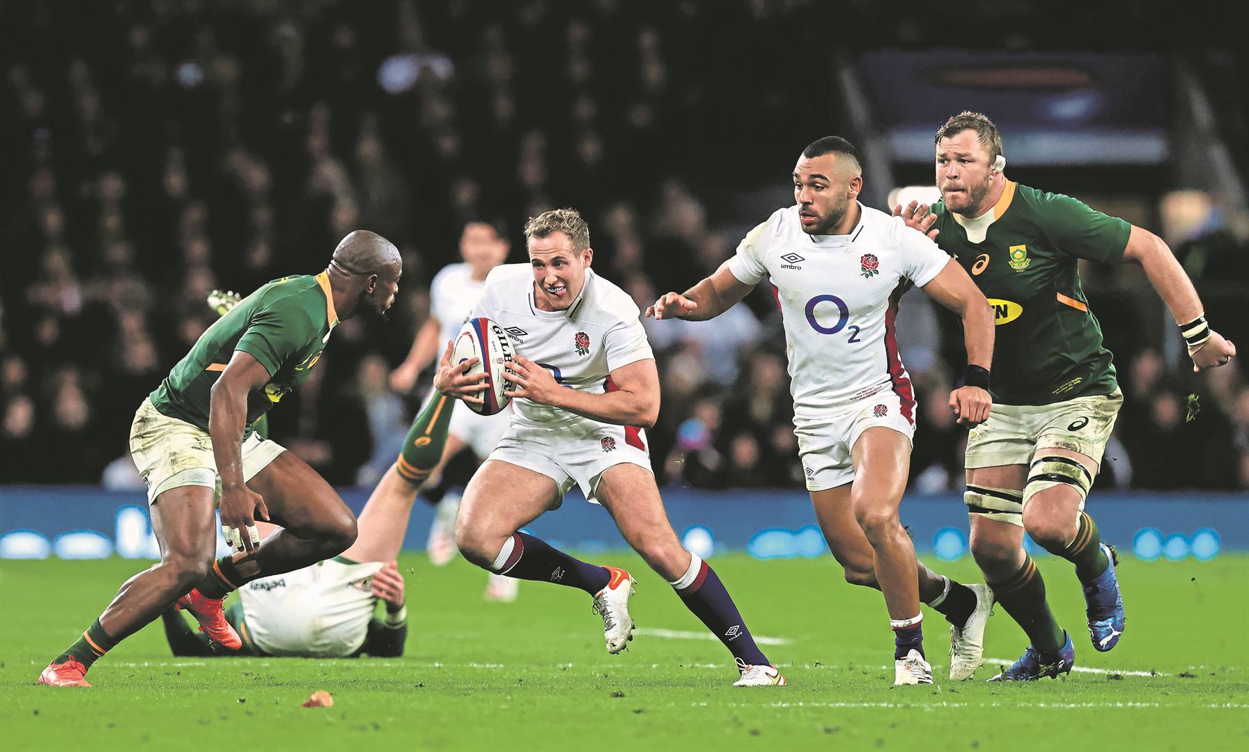 England’s Max Malins tries to take on Springbok Makazole Mapimpi during their Autumn Nations Series match at Twickenham Stadium on November 20. Photo: David Rogers/Getty Images