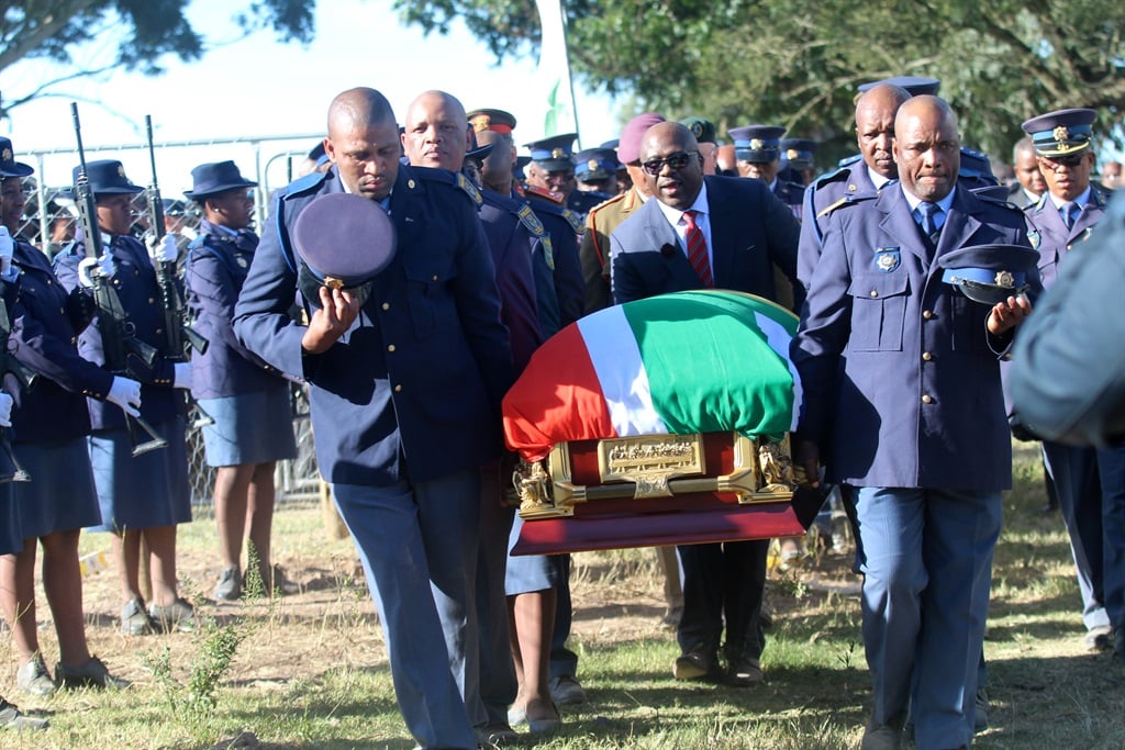 The coffin of Queen Fikelephi Bongolethu Ndamase is carried by cops to the graveside at Nyandeni Great Place for burial. Picture: Ziyanda Zweni