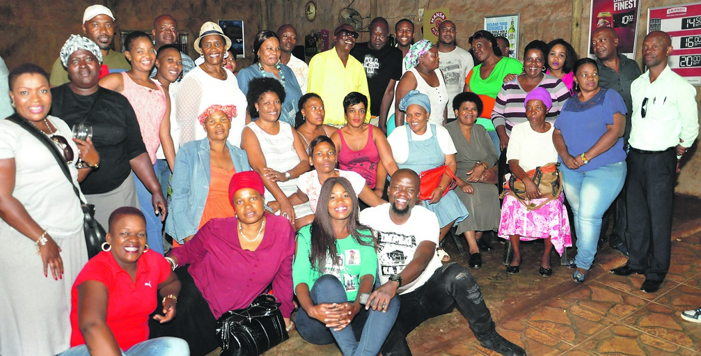 The merry members of Vukuzenzele Social Club at a weekly gathering.    Photo by Samson Ratswana