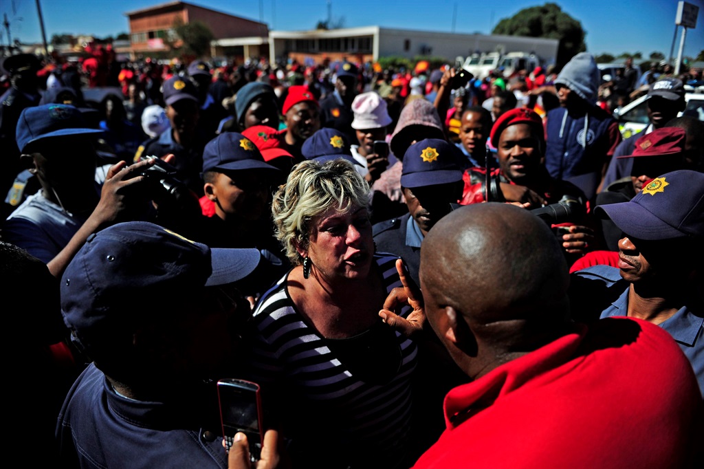 Tash Botha gets a hostile reception from EFF marchers in Coligny.Picture: Tebogo Letsie/City Press
