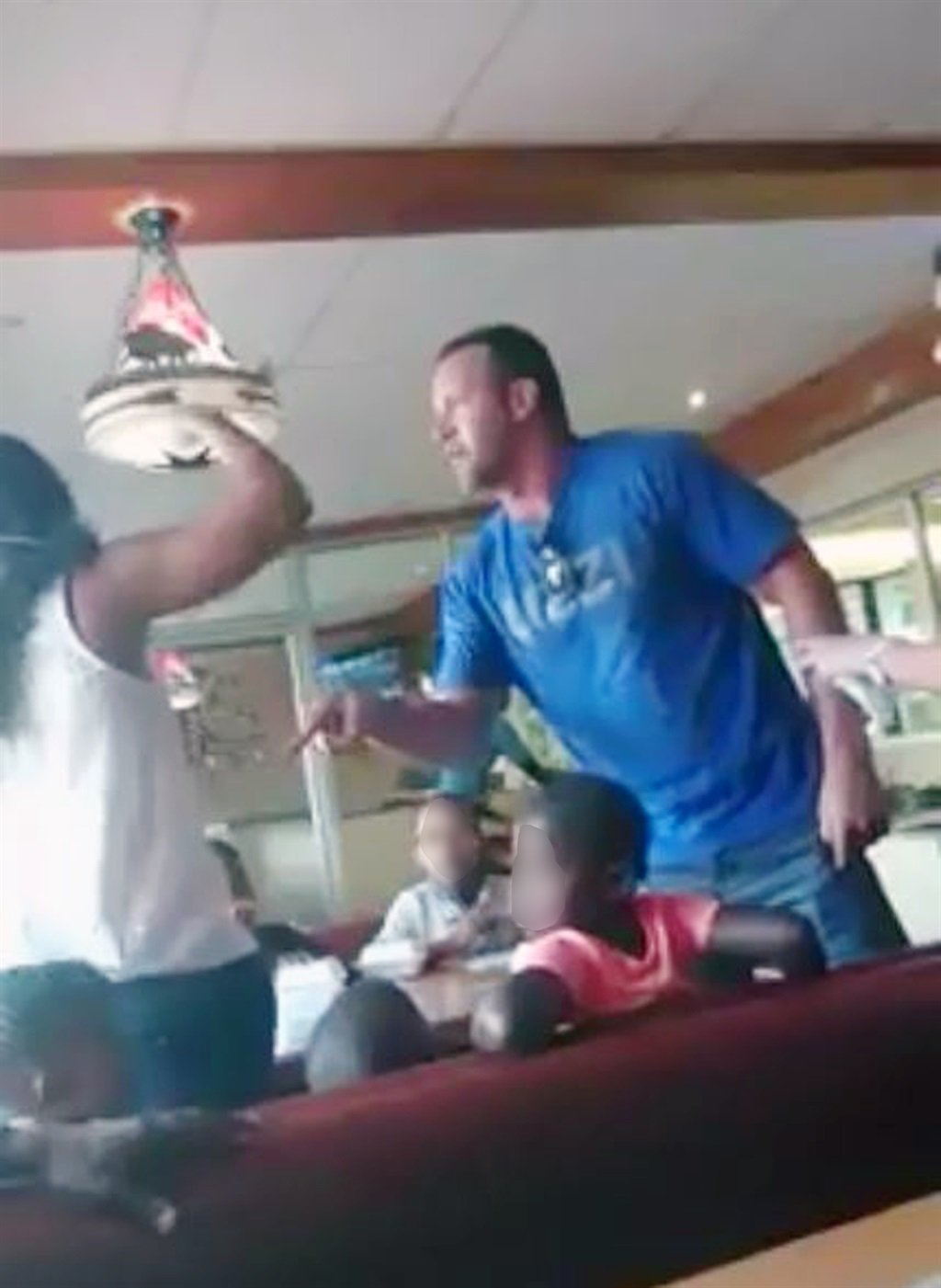 Screengrabs from a video of a man threatening to attack a woman inside a Spur restaurant at The Glen in Johannesburg. Picture: Screengrab from supplied video