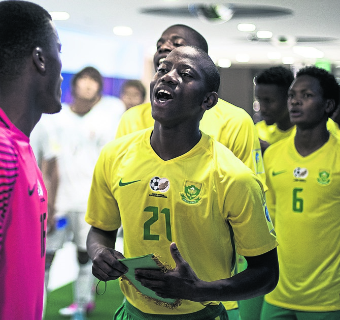 Thabo Cele of South Africa (No 21) sings with teammates in the tunnel prior to Amajita’s Fifa U-20 World Cup match against Japan. Photo by Getty Images