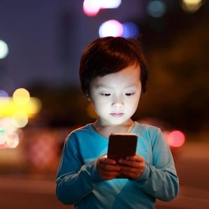 Too much time staring at screens can hamper a child's development. 