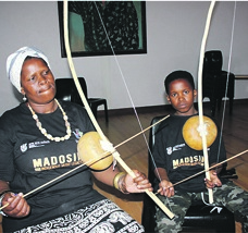 Luleka Zepe is learning to play rare traditional instruments with her son Lima. Photo by Lindile Mbontsi