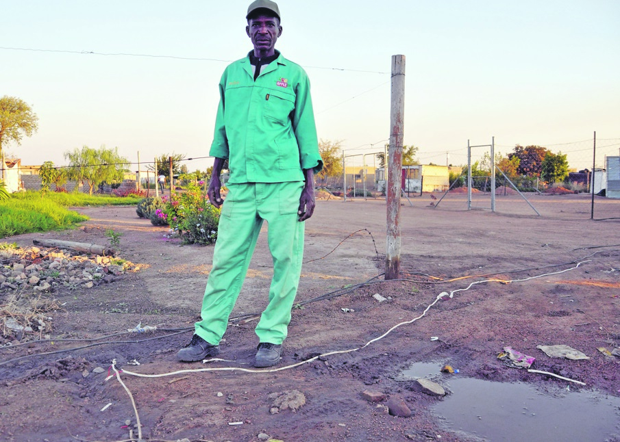 Ankies Dewee next to the wires that killed Lebohang.