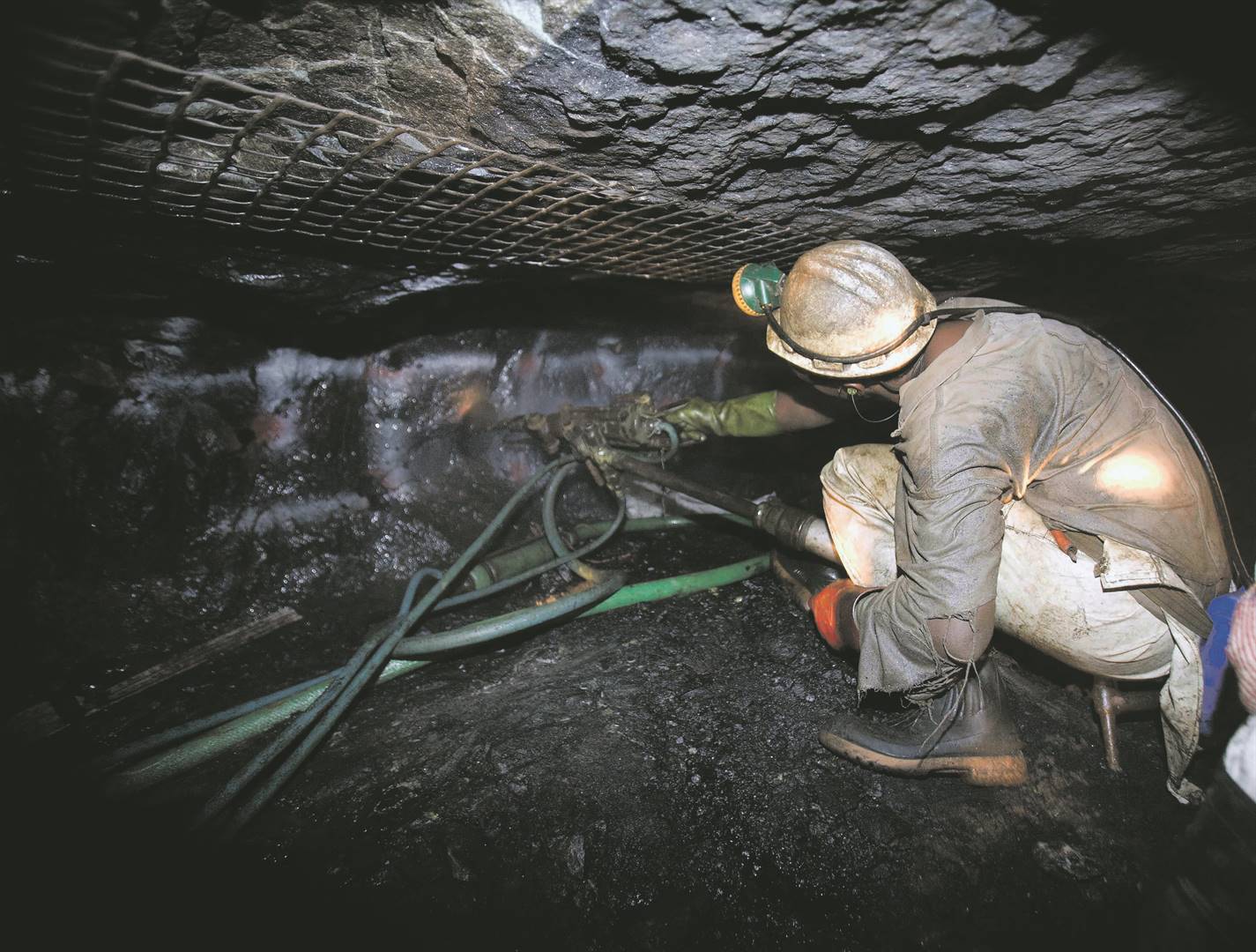 A mineworker with a drill on the rock face. Mine safety has again come under scrutiny following deaths this year. Photo: Bloomberg