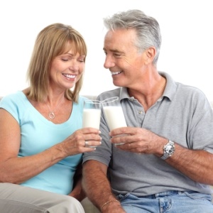 Couple drinking milk from Shutterstock
