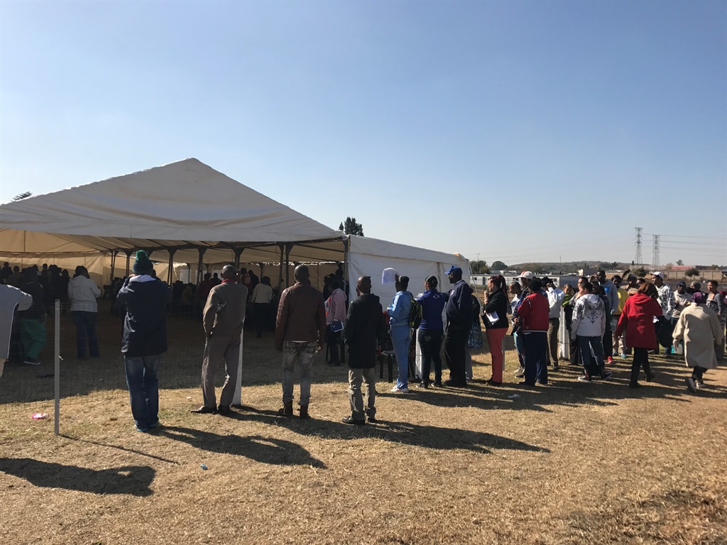 Residents of Eldorado Park queue for the verification and registration of housing at Eldorado Park Secondary School.PHOTO: Amanda Khoza