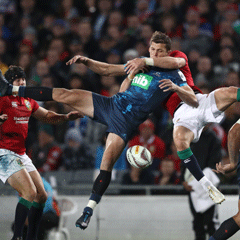 Matt Duffie of the Blues is tackled in the air by Liam Williams of the British and Irish Lions (Getty Images)