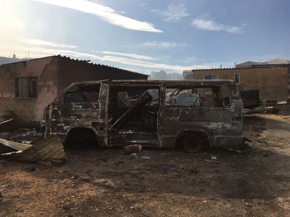 <em>Fire damage in White Location informal settlement. Roughly five additional homes were destroyed by fires in the area on Friday morning. (James de Villiers, News24)</em>
