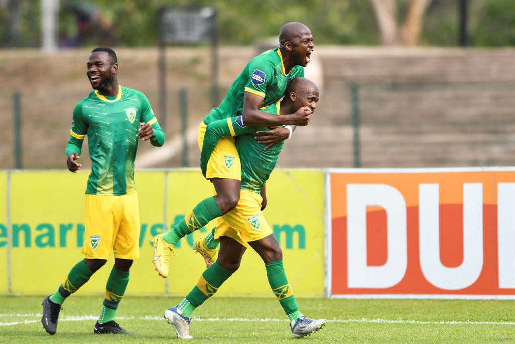 DURBAN, SOUTH AFRICA - SEPTEMBER 17: Nduduzo Sibiya of Lamontville Golden Arrows FC celebrates scoring with mates during the DStv Premiership match between Golden Arrows and Swallows FC at Princess Magogo Stadium on September 17, 2022 in Durban, South Africa. (Photo by Darren Stewart/Gallo Images)