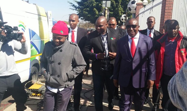 EFF leader Julius Malema, along with EFF spokesperson Mbuyoseni Ndlozi, Deputy President Floyd Shivambu and others leave the court house.<br />