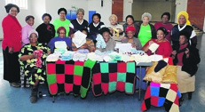Members of Kwakanya Lavela Ilanga, a non-profit organisation, knitted and bought clothes for patients at Dora Nginza Hospital.                                    Photo by Chris Qwazi