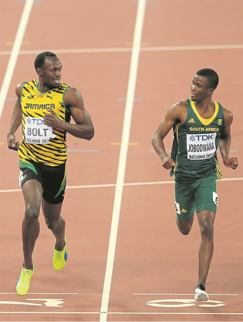 Watching over his shoulder Usain Bolt (left) must be wary of the likes of Anaso Jobodwana in Rio later this year  PHOTO: Lintao Zhang / Getty Images 