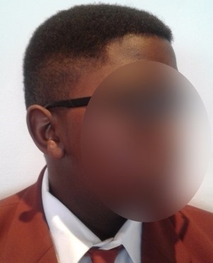The boy with the haircut deemed 'exotic' by his school. Photo supplied