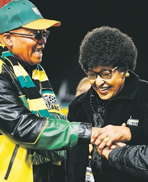 Winnie Madikizela-Mandela joins hands with President Jacob Zuma and his deputy, Cyril Ramaphosa, in a show of unity at the opening of the party’s National Policy Conference on Friday. Photo: leon sadiki
