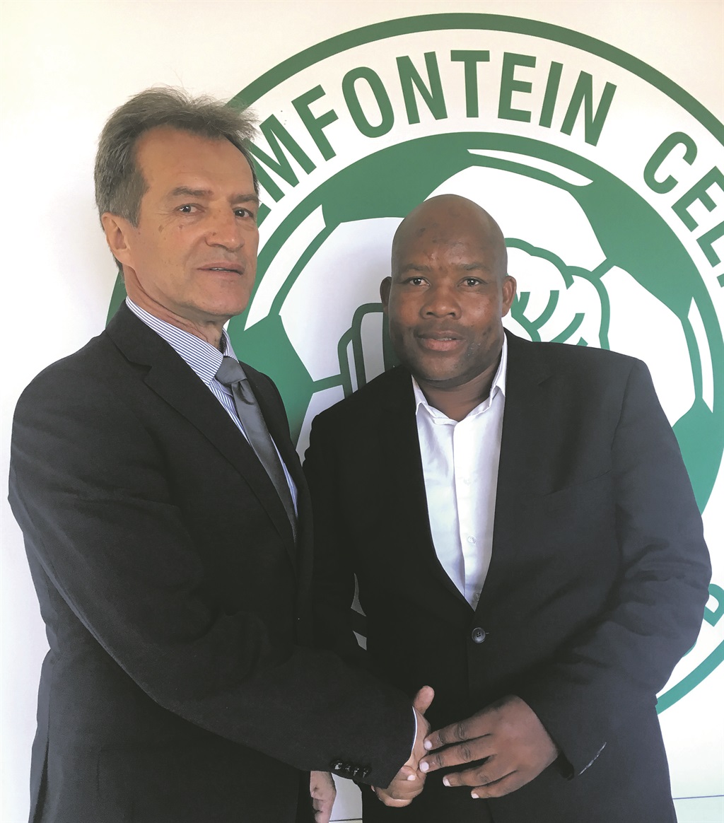 New Bloemfontein Celtic coach, Veselin Jelusic, shakes hands with his new boss Max Tshabalala (right) after concluding a two year-deal yesterday.