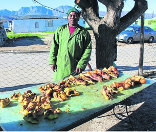 Mninawa Nondlwane’s pork is a hit in Nomzamo.      Photo by   Velani Ludidi