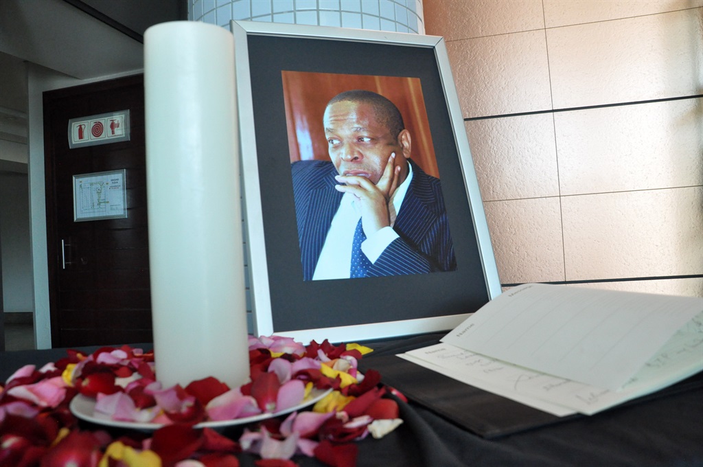 Mourners remember Ronnie Mamoepa. Picture: Samson Ratswana