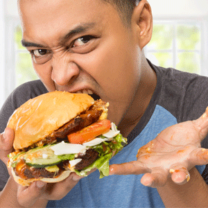 Man eating a burger 