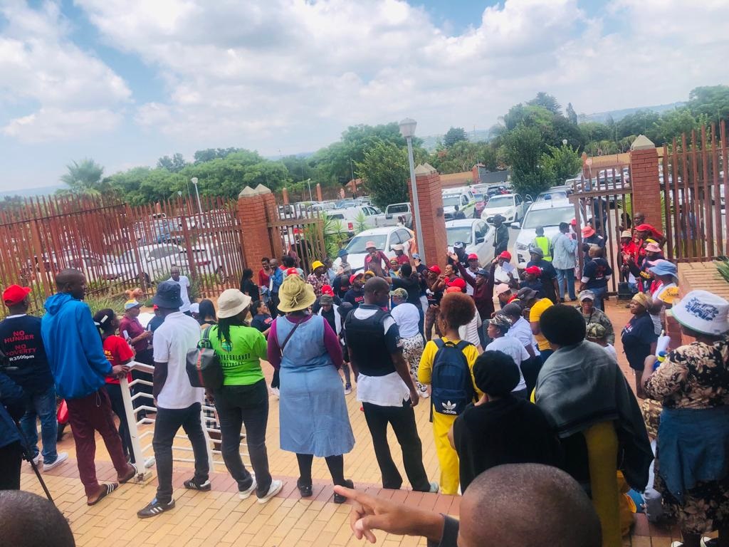 The community of Diepsloot outside Randburg Magistrates Court to support the five men accused. Photo by Sylvester Sibiya