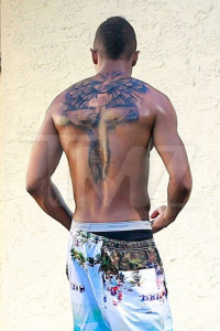 *EXCLUSIVE* Nick Cannon displays his Mariah tattoo cover up job