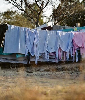 Hospital laundry cleaned by the staff of Mphefhedzi Business Enterprise covers washing lines. Picture: City Press