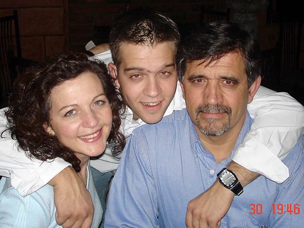 Sergio with his mom and dad. PHOTO: Supplied