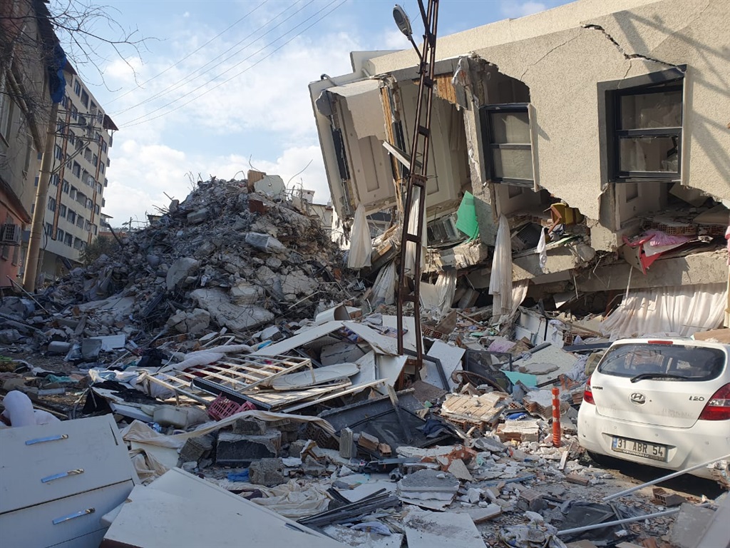 Collapsed buildings and rubble following earthquake