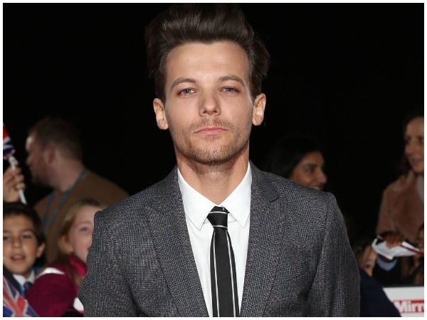 Grieving Louis Tomlinson performs days after mum's death | You