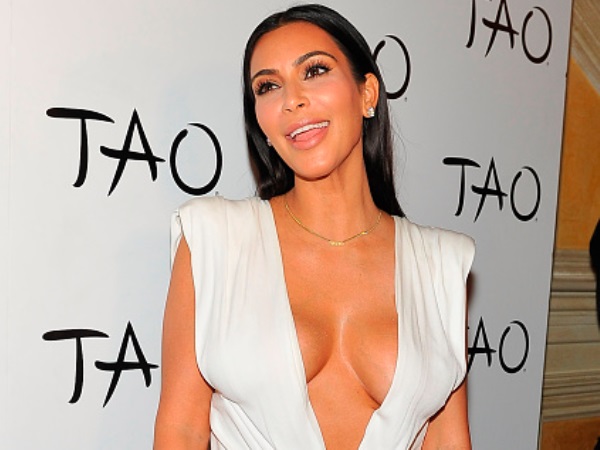 Kim Kardashian: My boobs were too big!