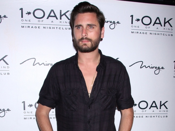 SPOTTED: Scott Disick Exhibits His Extensive Designer Bag Game